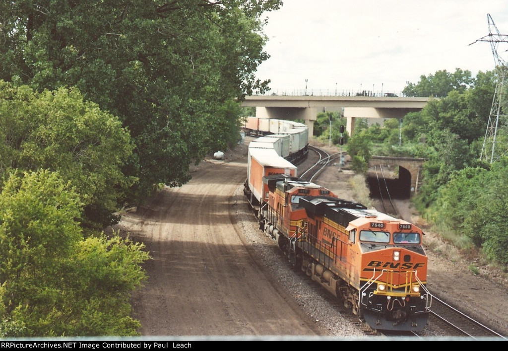 Eastbound intermodal threads its way through Westminter